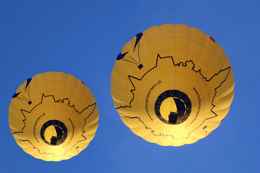 Ballooning two yellow balloon