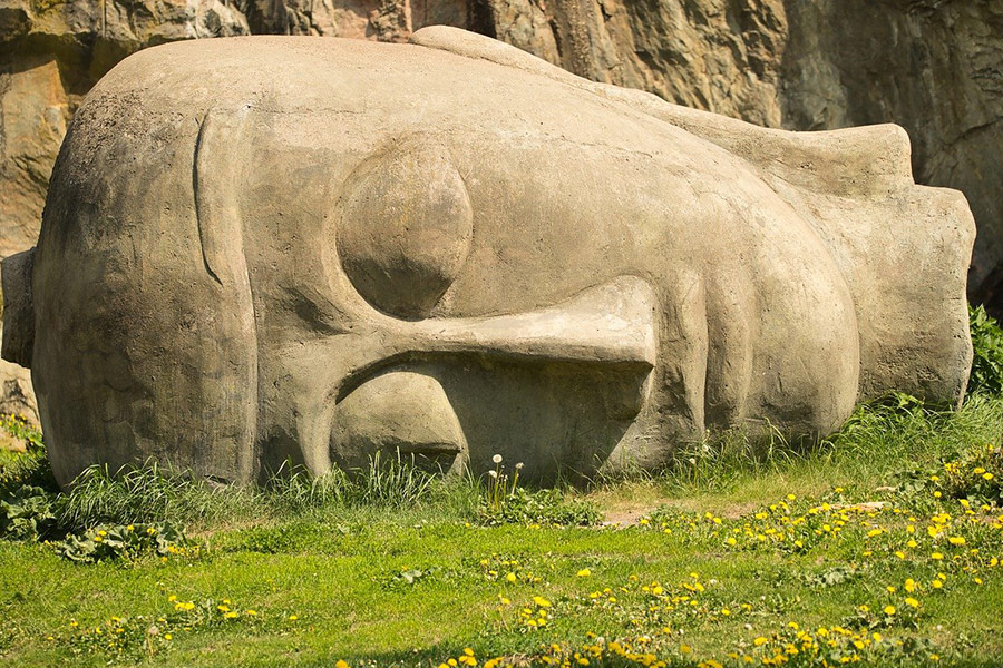 Stone face statue