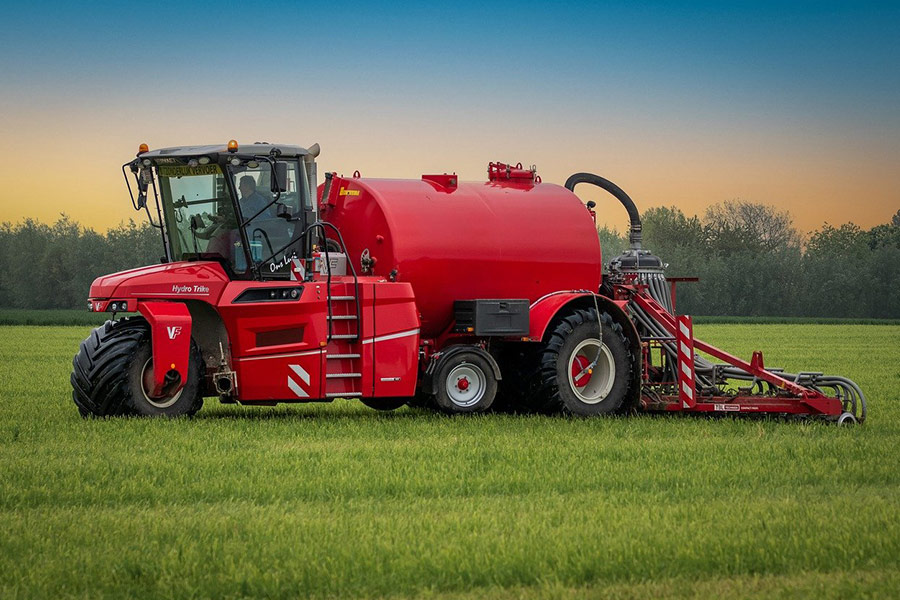 Red farmer machinery field tillage