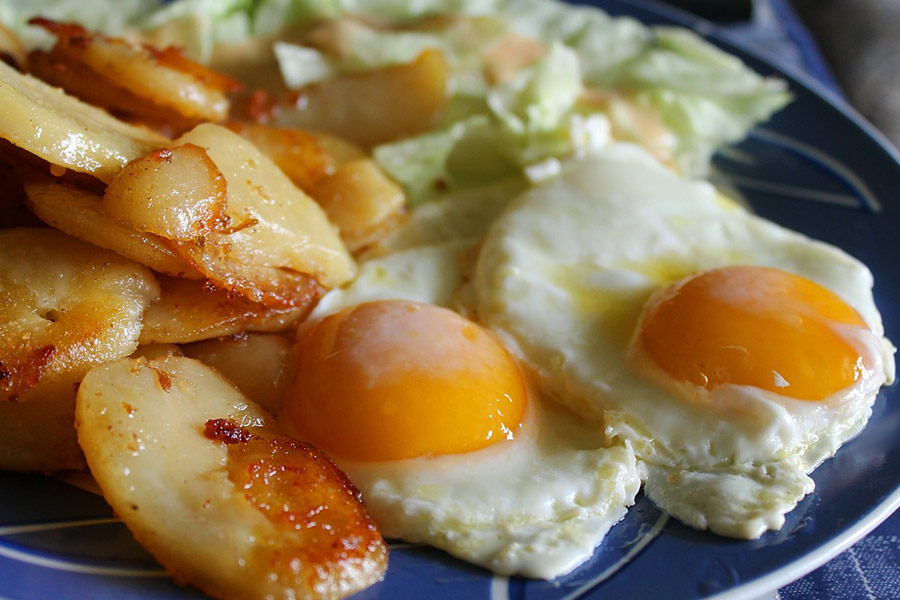 Fried potatoes and eggs