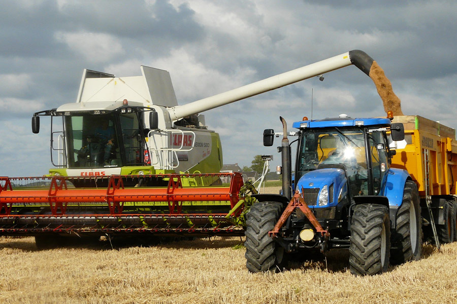 Tractors harvesting