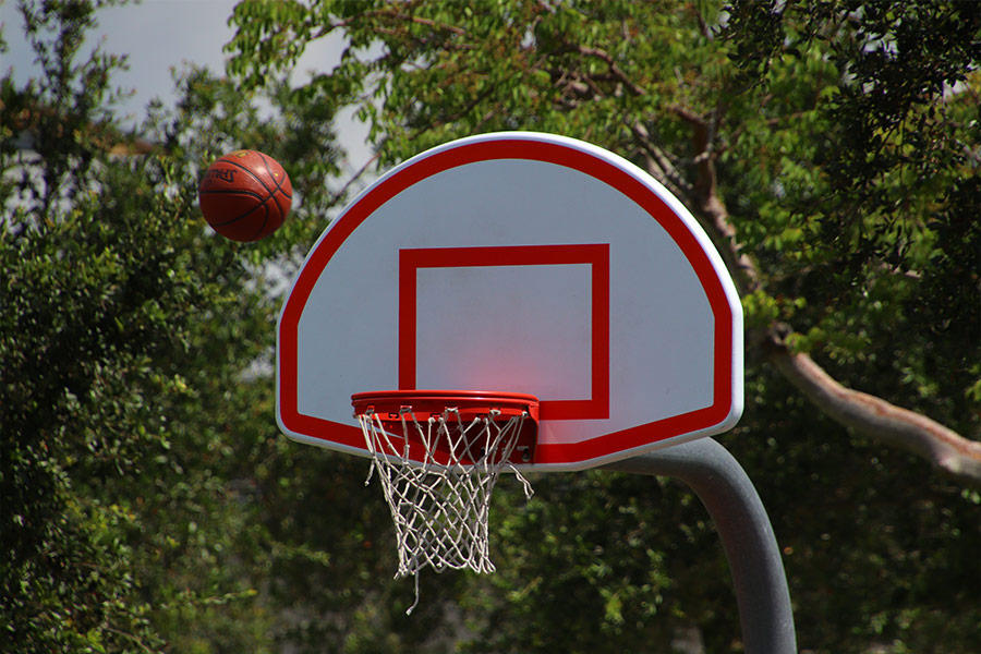 Ball near basketball hoop