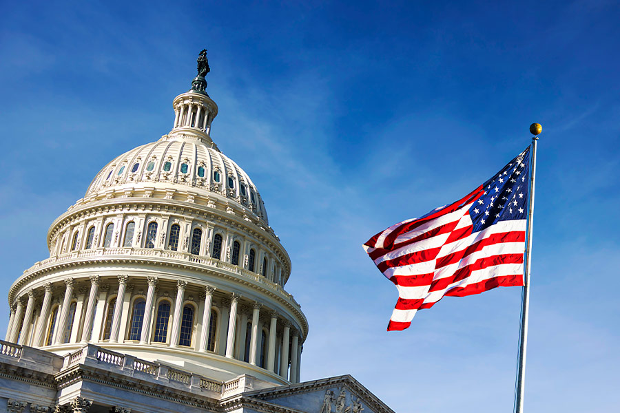 American flag waving capitol hill