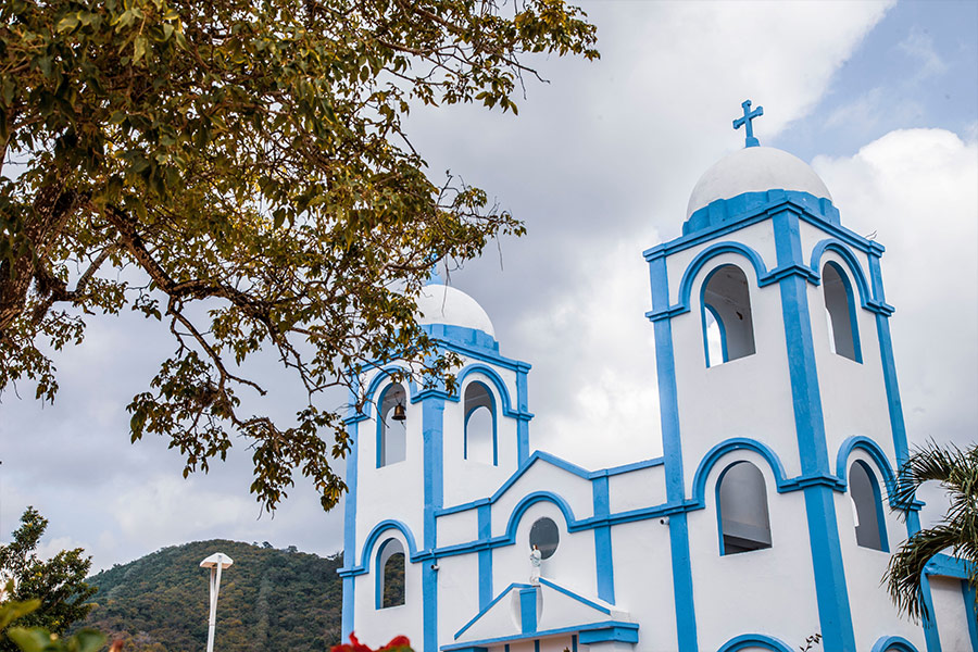 White blue concrete church Chalan Colombia