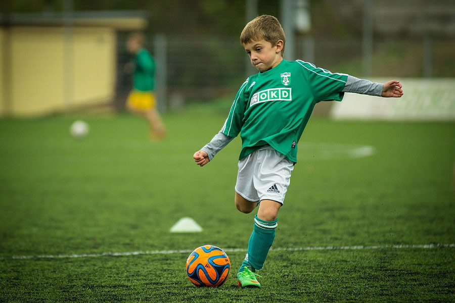 Child soccer footballer