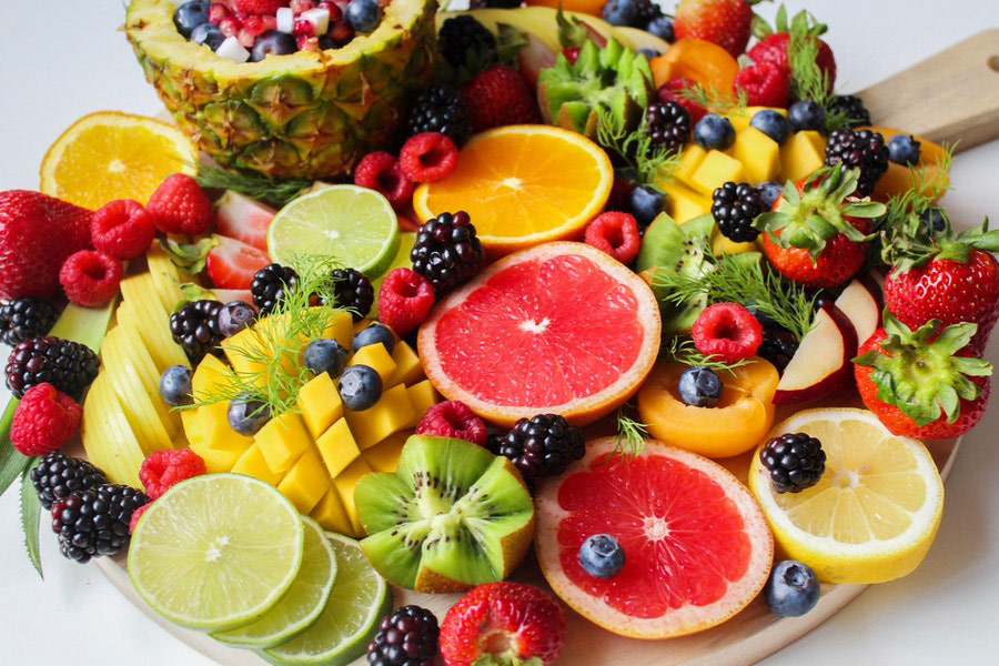 Sliced fruits on tray