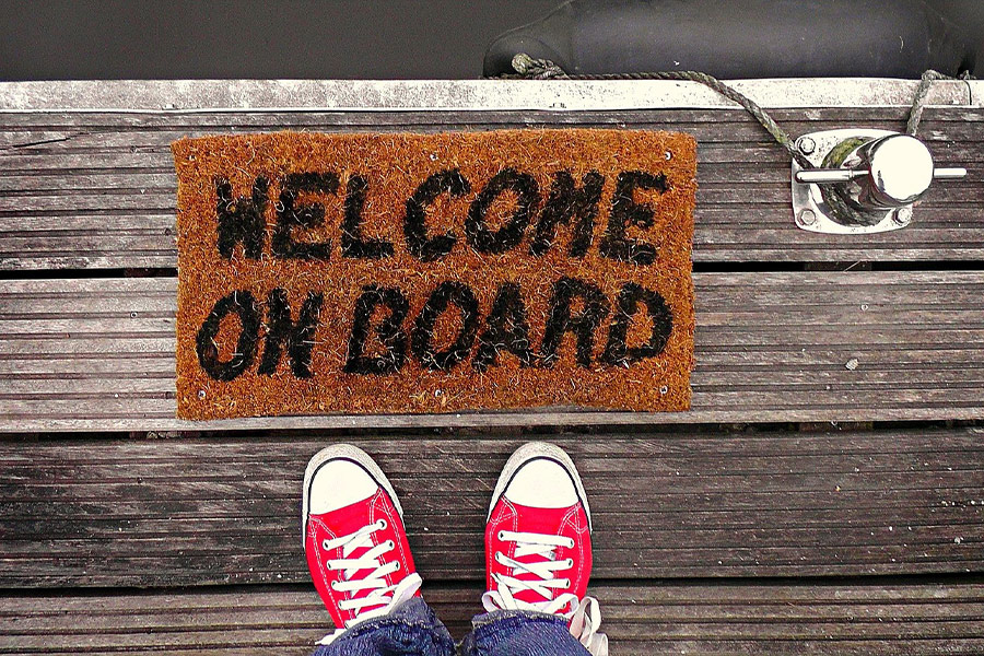 Dock with welcome on board doormat