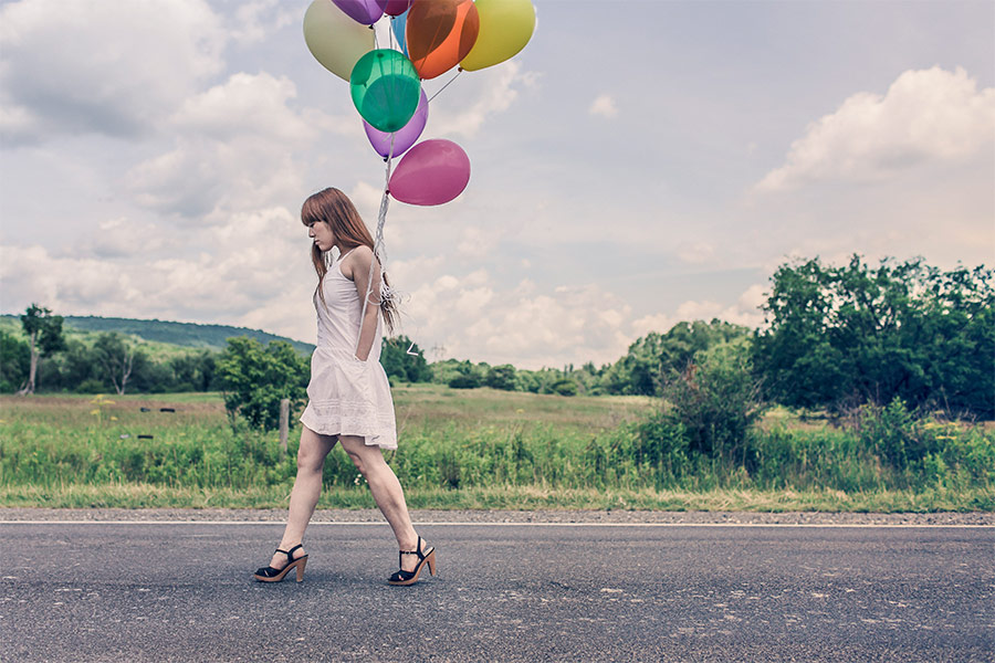 Woman with balloons