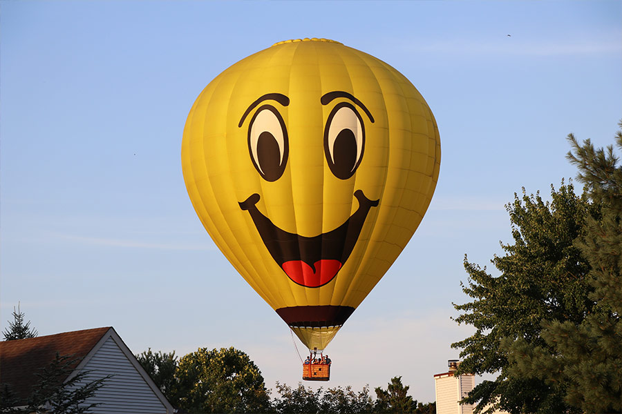 Yellow hot air balloons on air