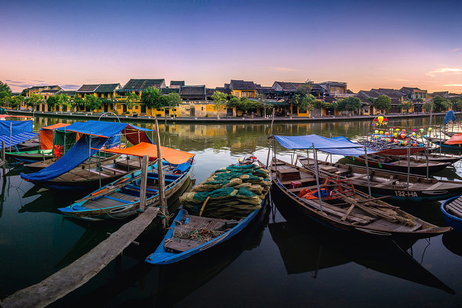 Port river boats building trees and houses