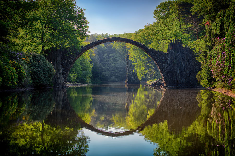 Gray bridge and trees
