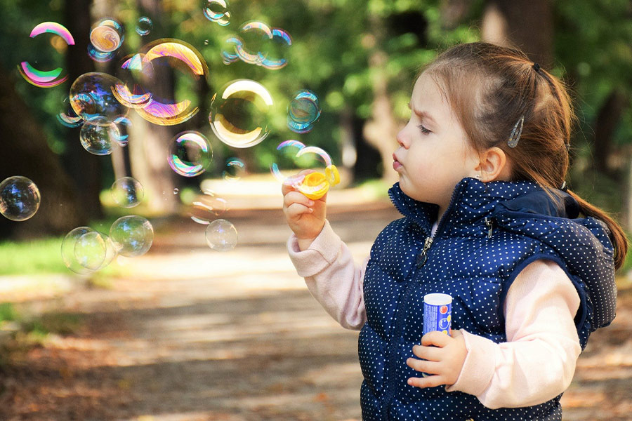 Soap bubbles child joy play