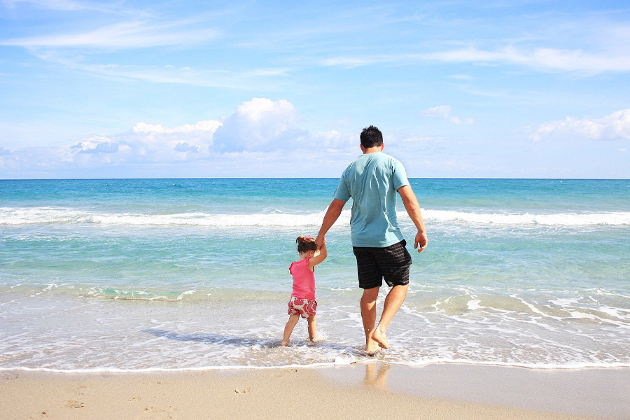 Father daughter family beach vacation