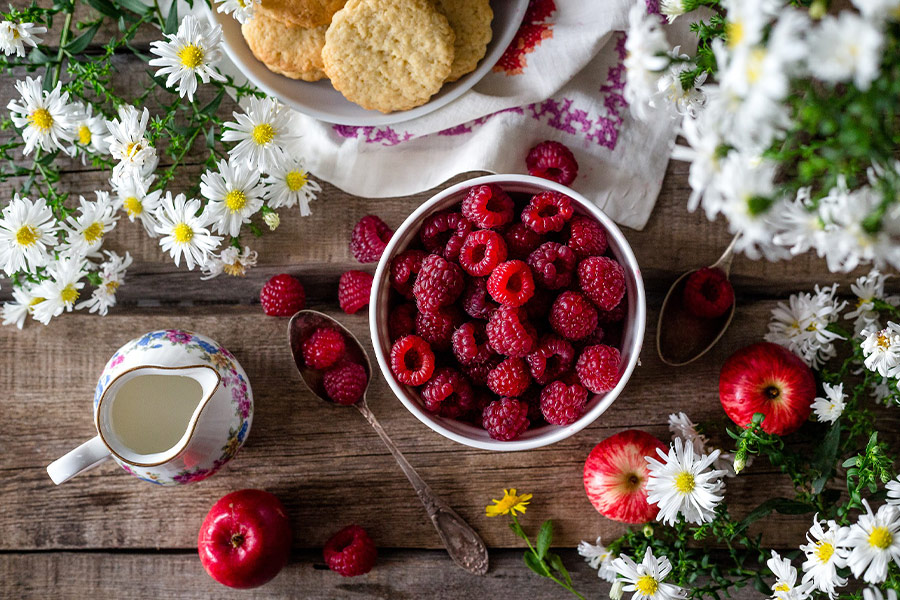 Summer raspberries ripe harvest in bowl