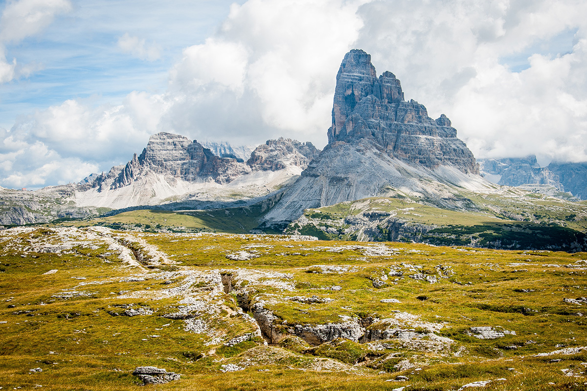 Green field with mountains
