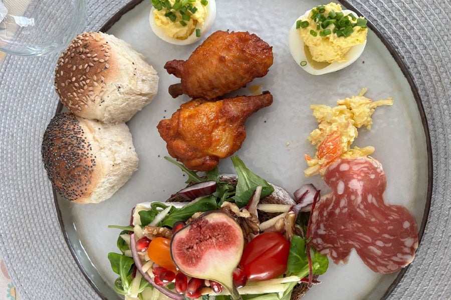 Assorted breakfast with fresh salad