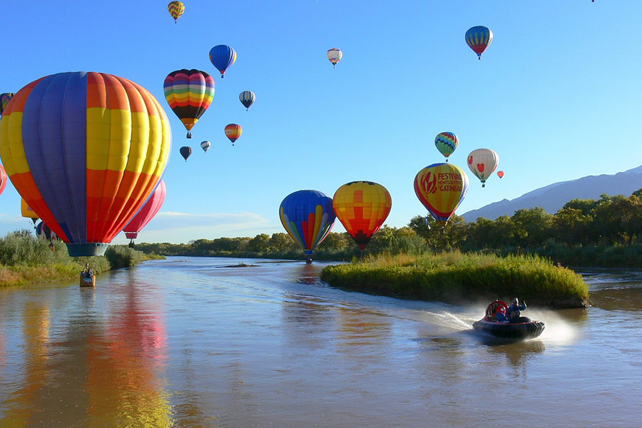 Hot air balloons lake sides