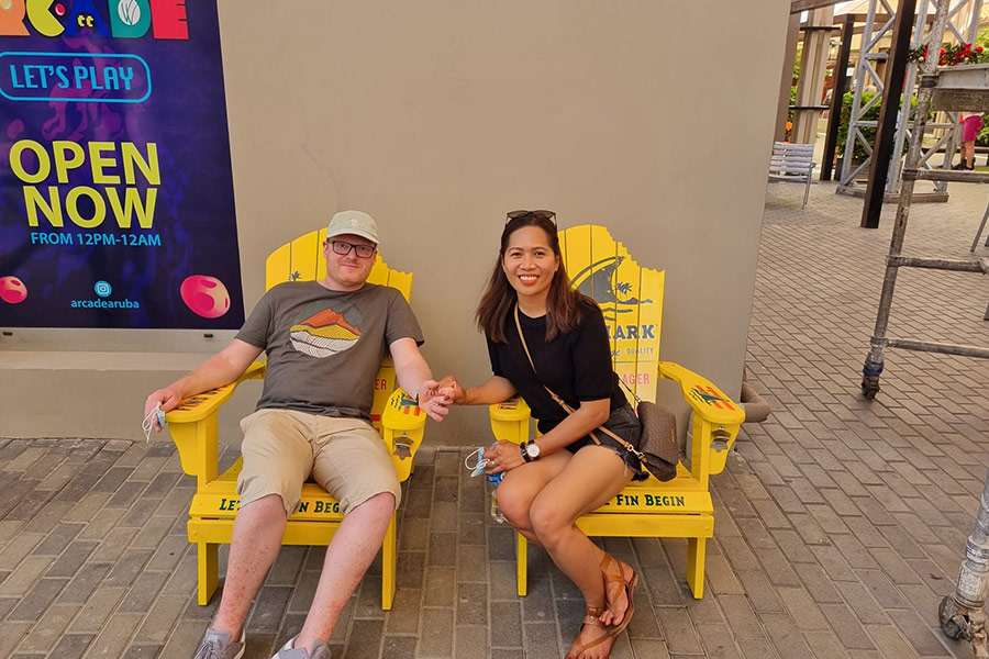 Couple in yellow chair