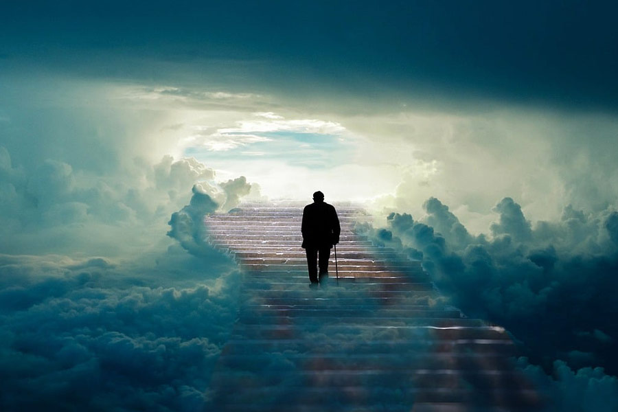 Old man climbing heavens stairs