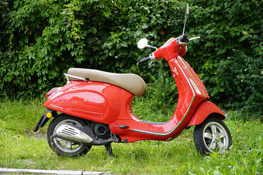 Vespa primavera red scooter