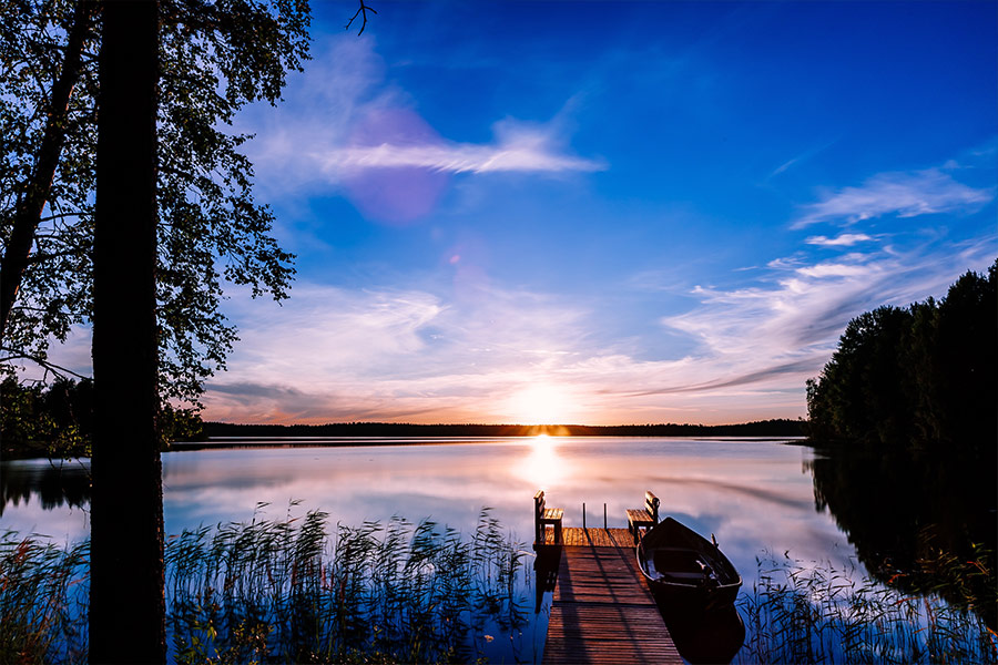 Wooden pier with fishing boat