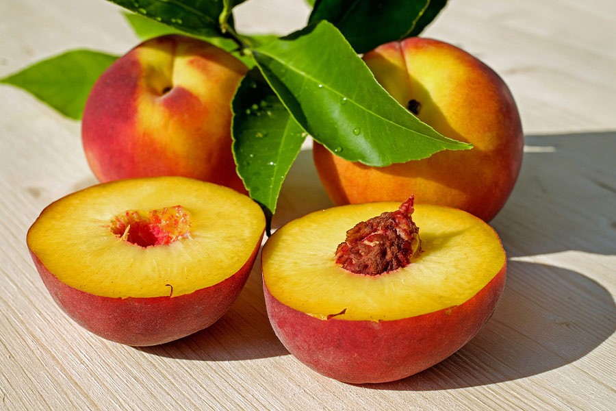 Sliced ripe peaches fruits