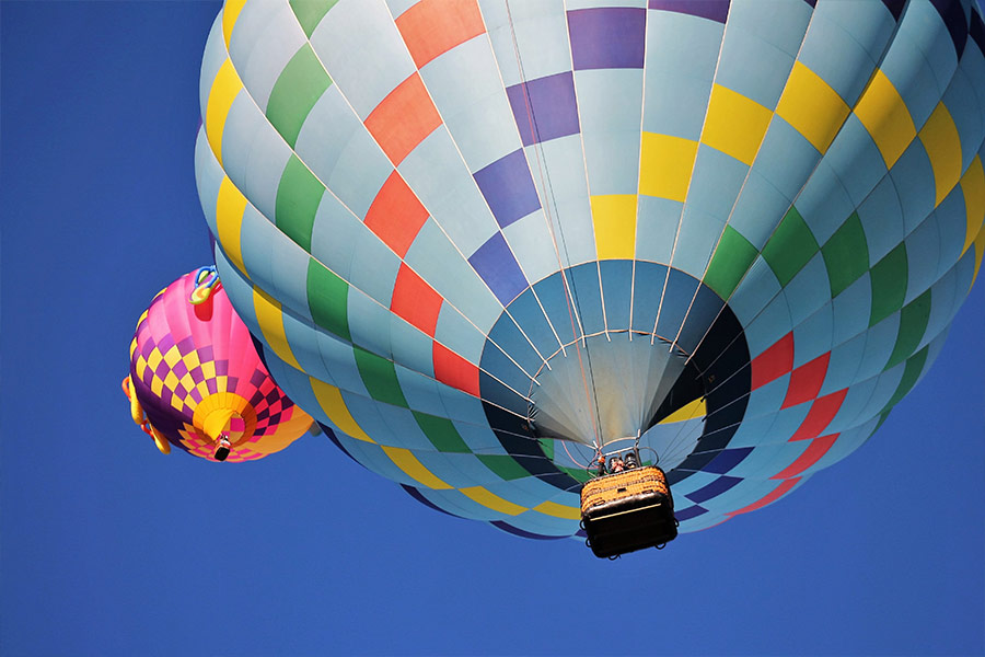 Blue and multicolored hot air balloon