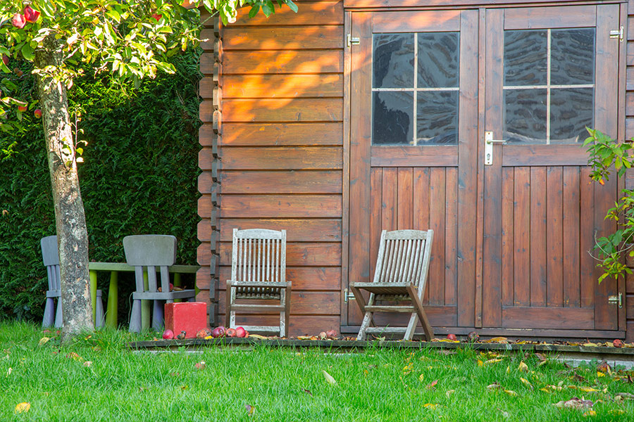 Wooden garden tool shed beautiful park
