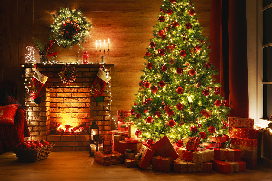 Red christmas tree decoration gift with fire place