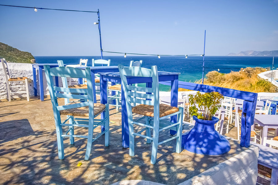 Nice chairs tables color beautiful view Greece