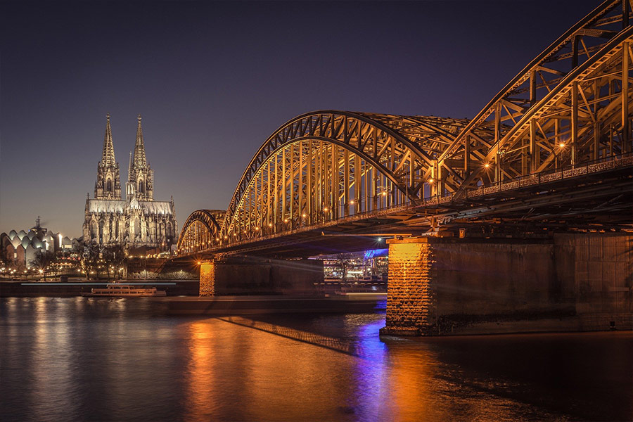 Cologne cathedral bridge night river