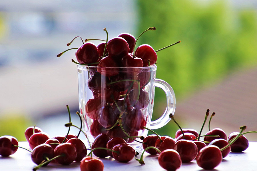 Cup with cherries fruit