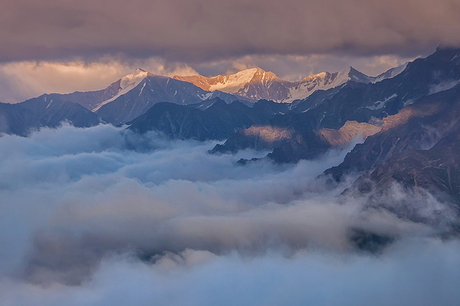The Caucasus Russia mountain fog sunset clouds