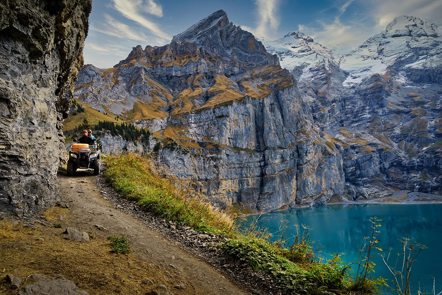 Mountain landscape pathway with tractor