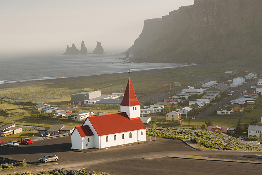 White and red church building