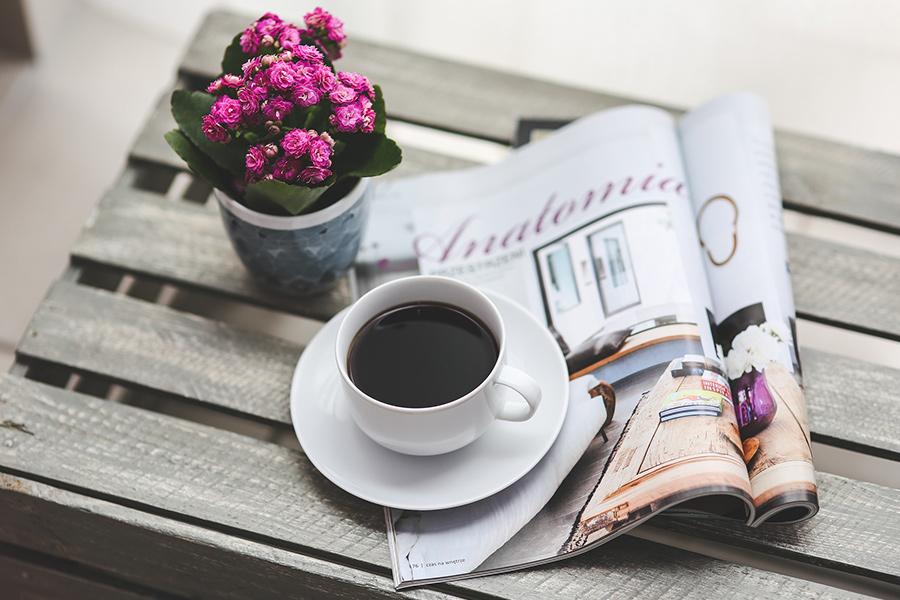 Black coffee reading magazine