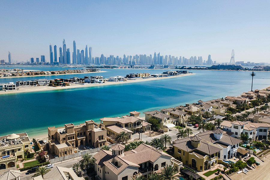 Villas in front of skyscapers in Dubai