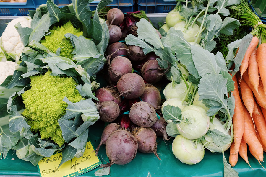 Assorted fresh ripe vegetables market stall