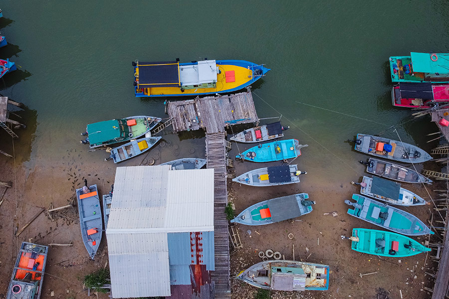 Boats docked on a seashore