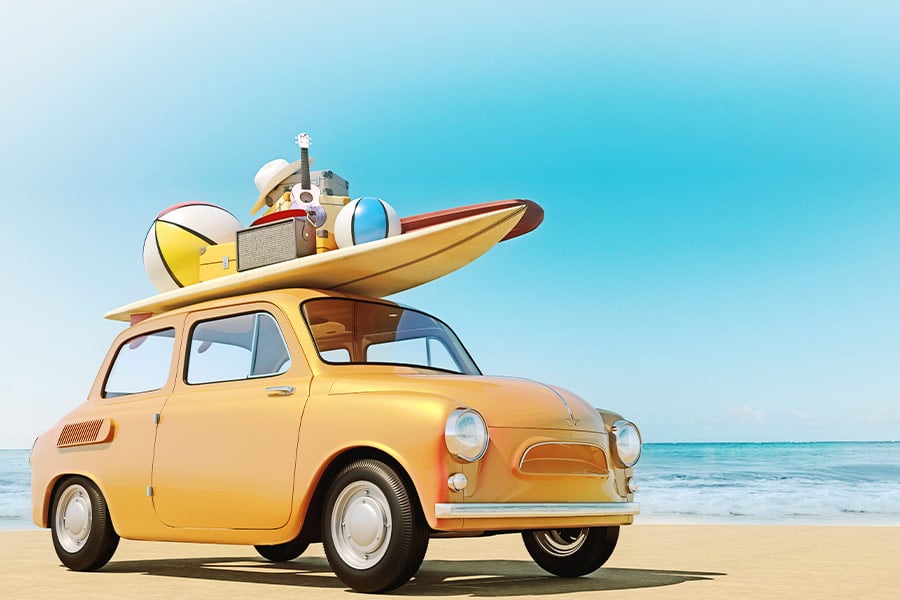 Small retro car with baggage beach equipment