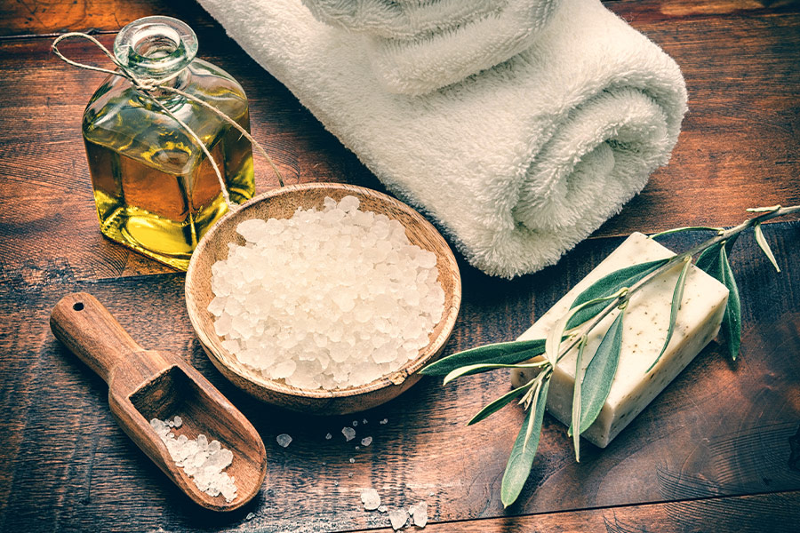 Spa setting with natural olive soap sea salt