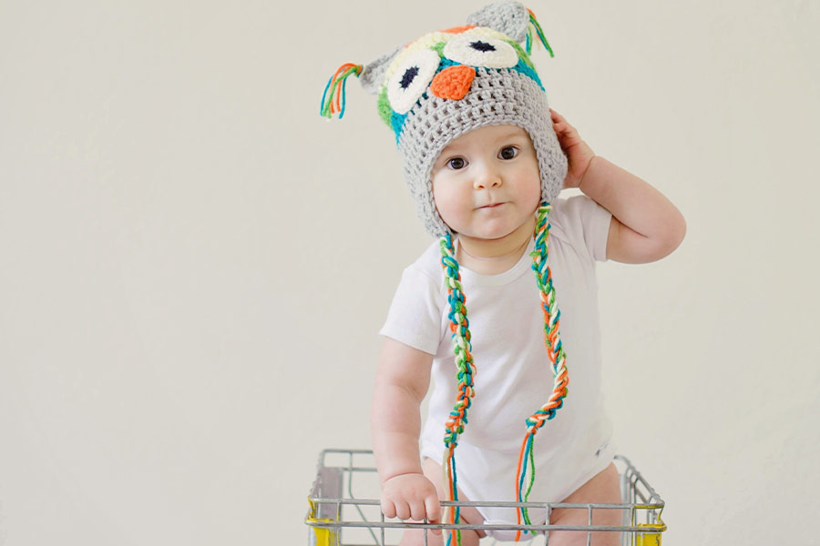 Toddler standing on basket