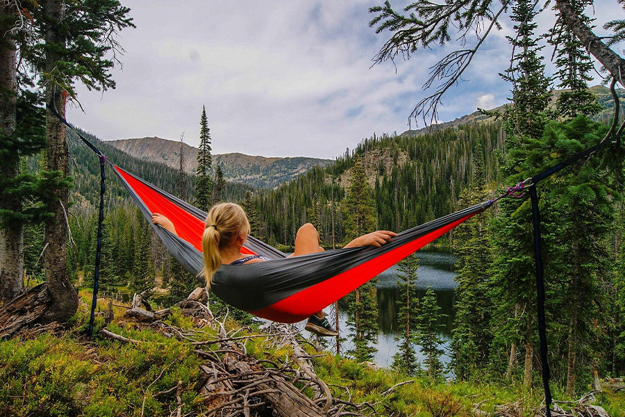 Woman relaxing hammock
