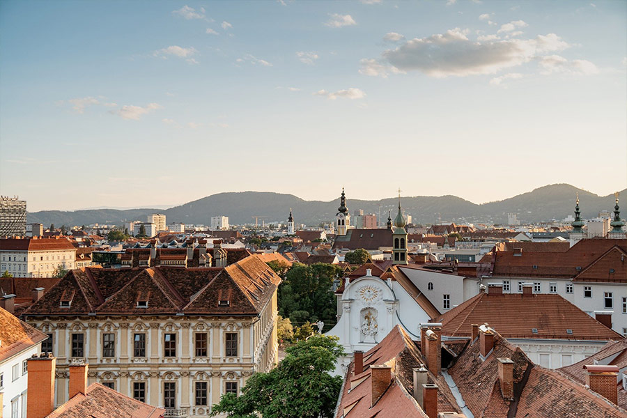Austria Graz City buildings skyline mountain