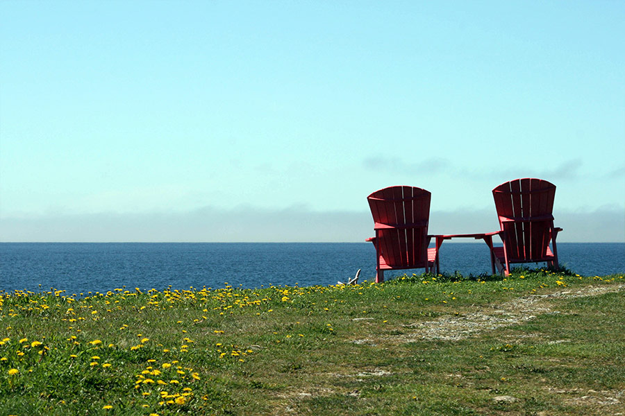 Ocean view with two red chair