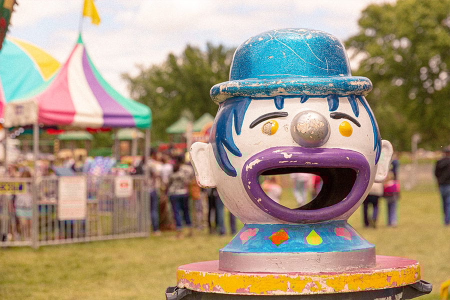 Clown face amusement ride