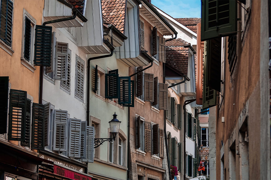 Front window houses alley