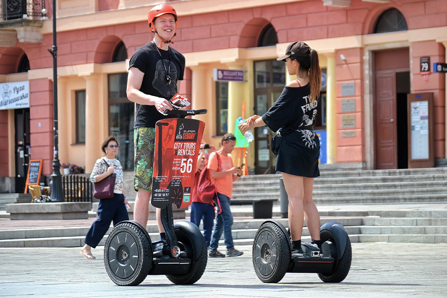 Electric vehicles young tourists people