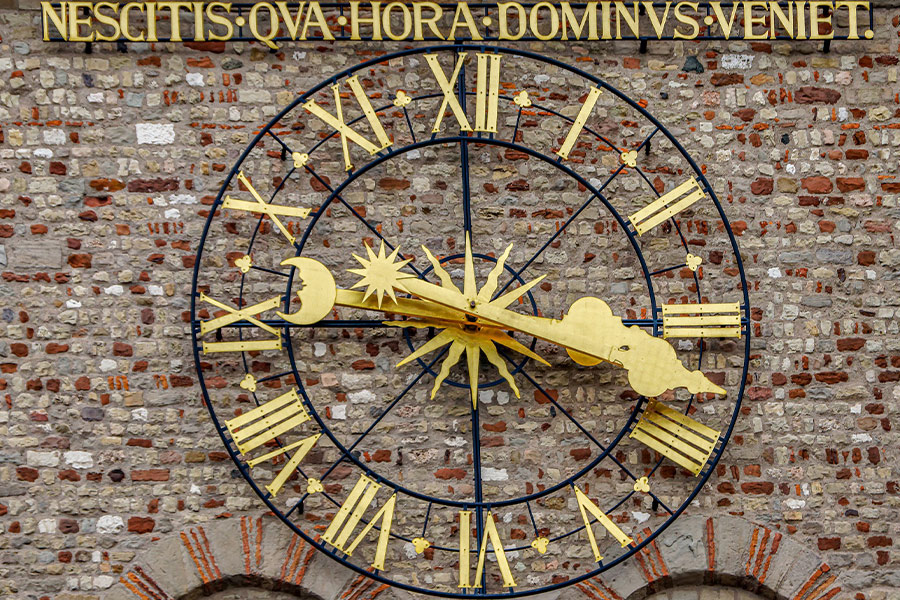 Historically old metal gold clock tower