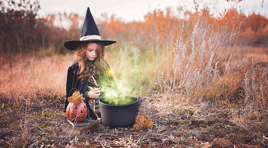 Girl in witch costume